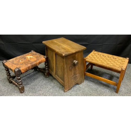 209 - An oak rectangular stool, the sides carved with flowerhead, hinged cover;  a rush seated stool; anot... 