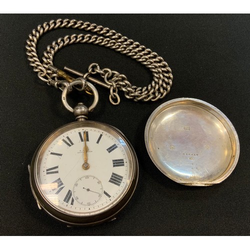 250 - A silver open faced pocket watch and Albert