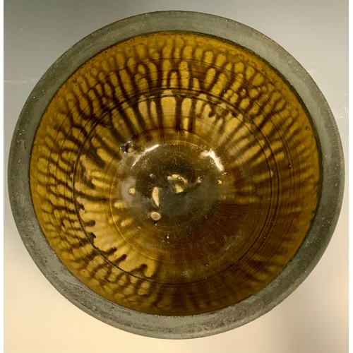 76 - Walter Keeler (Bn 1942), a studio pottery jardinere, the exerior mottled and ridges, the interior wi... 