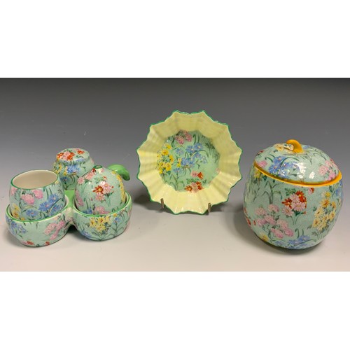 79 - A Shelley Melody Chintz three piece cruet set on stand, preserve jam, cover and dish