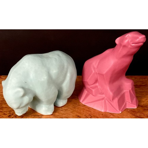80 - A Langley Mill Oakes period stoneware polar bear, in green, 10.5cm high, printed mark; another on ro... 