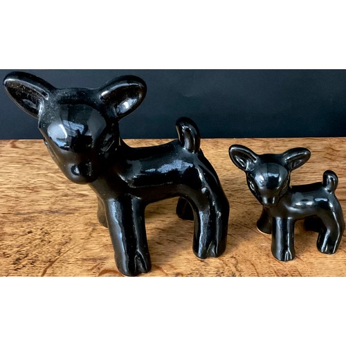 82 - A Bourne Denby Danesby Ware lamb, in black, 13cm high; another, 8cm high (2)