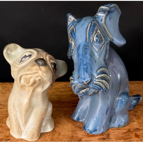 89 - A Langley Mill Oakes period woeful hound, in mottled tan, 17cm high and a terrier, in blue, 22.5cm h... 