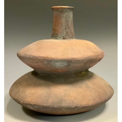 96 - Manner of Hans Coper, a compressed double gourd vase, decorated overall with lines, 18cm high,  18cm... 