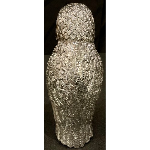 74 - A large silver plated novelty caster, as an owl, 15cm high