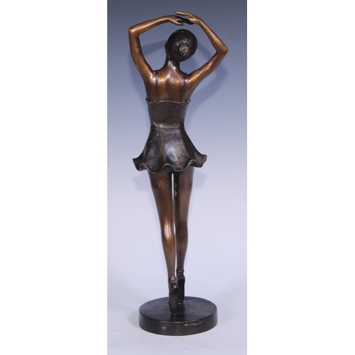 77 - In the manner of Demétre Chiparus, a bronze figure, dancing girl, 48.5cm high