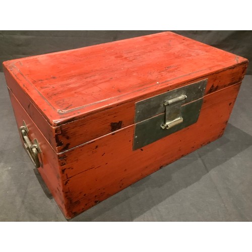 80 - A Japanese red lacquered rectangular box and cover, bronzed metal drop handles, 43cm wide