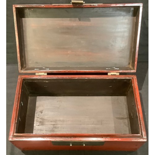 80 - A Japanese red lacquered rectangular box and cover, bronzed metal drop handles, 43cm wide