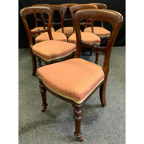 311 - A set of seven mid-Victorian mahogany balloon-back dining chairs, upholstered seats, turned legs, ce... 