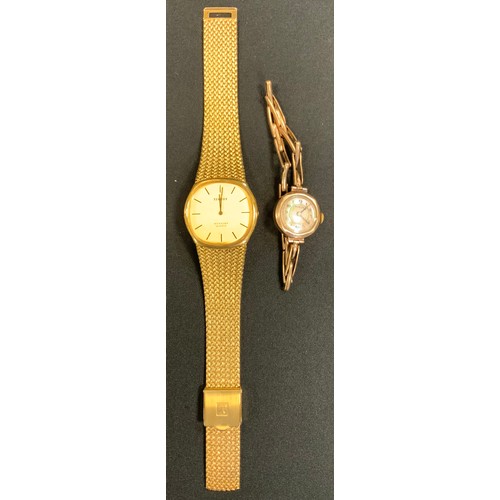 397 - A Tissot Stylist quartz wristwatch, integral bracelet, boxed with instructions;  a ladies 9ct gold c... 