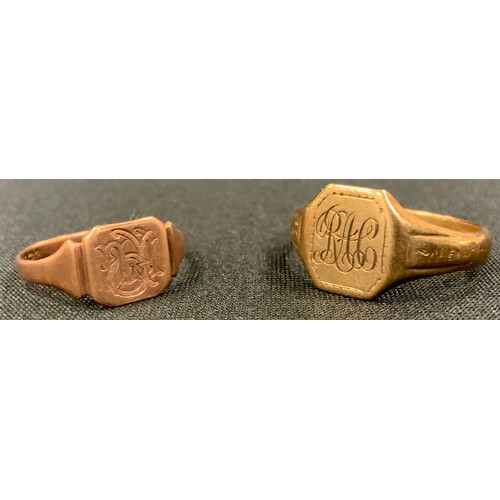 409 - A 9ct gold signet ring; another smaller; 9ct golds and yellow metal earrings;  9ct gold front and ba... 