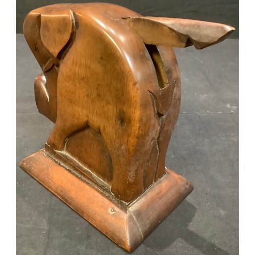 278 - An Art Deco mahogany money box, carved as a stylised elephant