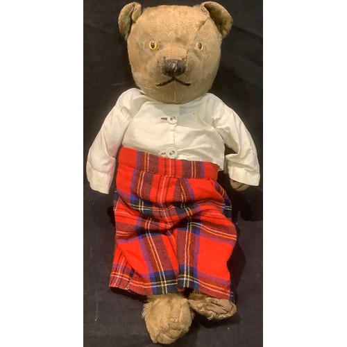 313 - A mid 20th century golden mohair jointed teddy bear with amber and black plastic eyes, 38cm high