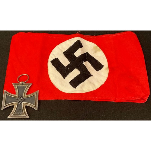 322 - A Third Reich swastika armband; a WWII iron cross