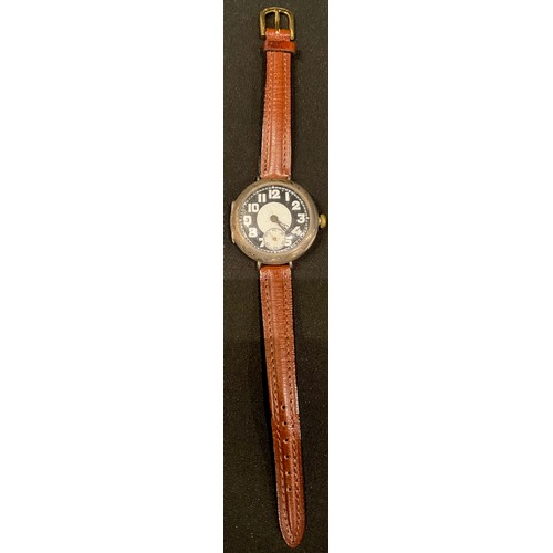 398 - A silver cased round Trench wristlet watch, leather strap