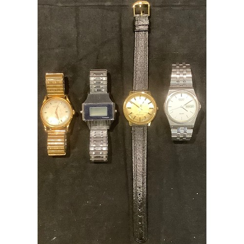 400 - Wristwatches - Timex digital, another Timex. White Star and Seiko day/date