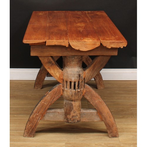 1 - An unusual rough-lumber and cartwheel hub dining suite, comprising dining table, 75cm high, 137cm lo... 