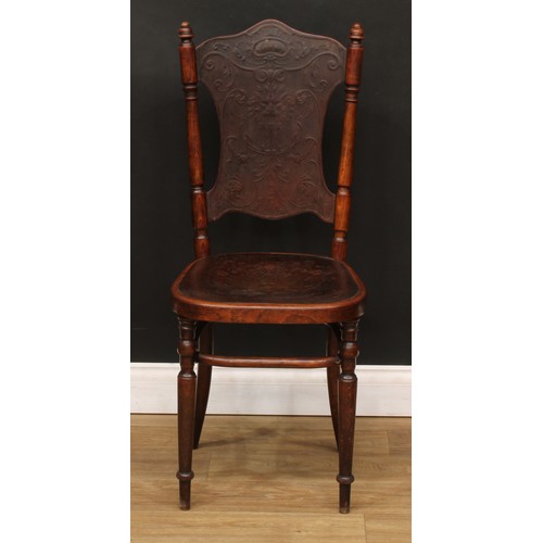 107 - A set of five Fischel bentwood chairs, comprising four side chairs and an armchair, the backs presse... 