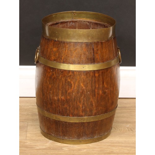 205 - A coopered oak fuel or log bin, 41cm high, the top 25cm diameter; a similar octagonal fireside bin, ... 