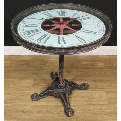 207 - A novelty centre table, the top as a quartz movement timepiece, 76.5cm high, the top 75cm diameter