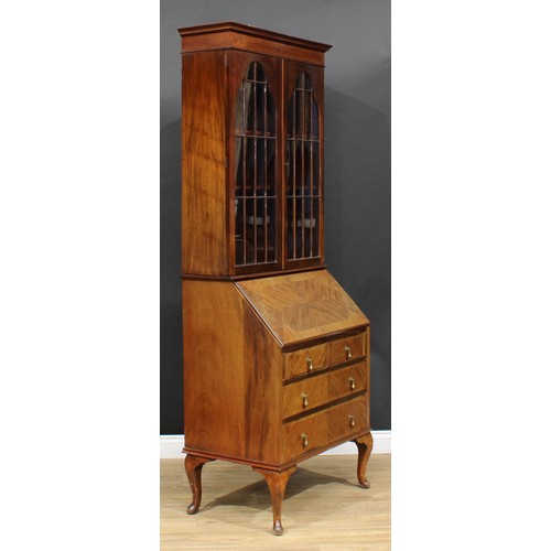 214 - An early 20th century mahogany bureau bookcase, 205cm high, 81.5cm wide, 50cm deep