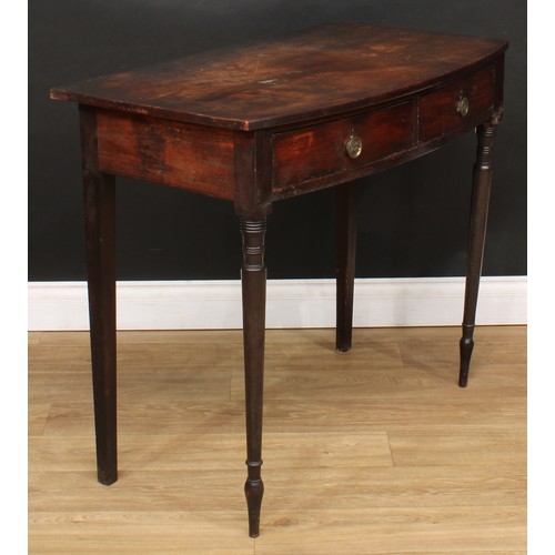 215 - A George III mahogany bowfront side table, oversailing top above a pair of frieze drawers, turned fo... 