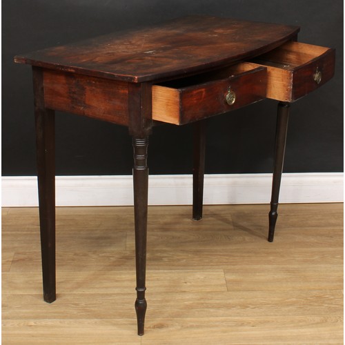 215 - A George III mahogany bowfront side table, oversailing top above a pair of frieze drawers, turned fo... 