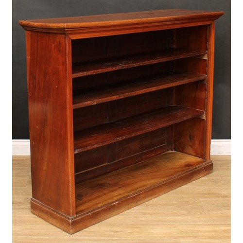 216 - A late Victorian walnut open bookcase, rectangular top above three adjustable shelves, skirted base,... 