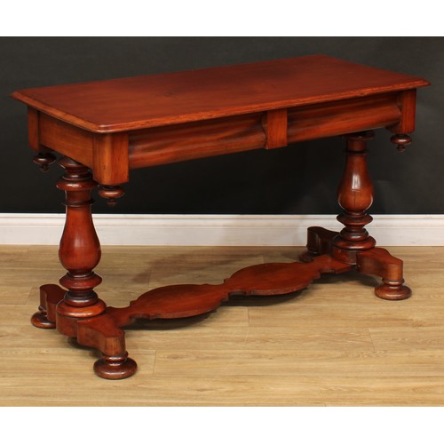 217 - An early Victorian mahogany side table, moulded top above a pair of concave frieze drawers, turned b... 