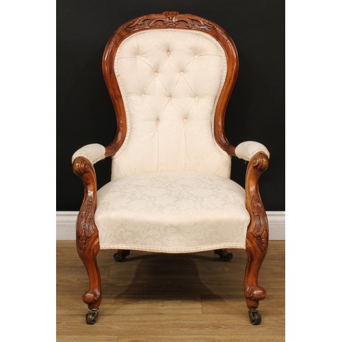 522 - A Victorian spoon back open armchair, 95cm high, 67cm wide, the seat 48cm wide and 47cm deep; a set ... 