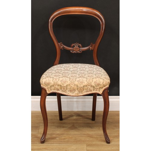 522 - A Victorian spoon back open armchair, 95cm high, 67cm wide, the seat 48cm wide and 47cm deep; a set ... 