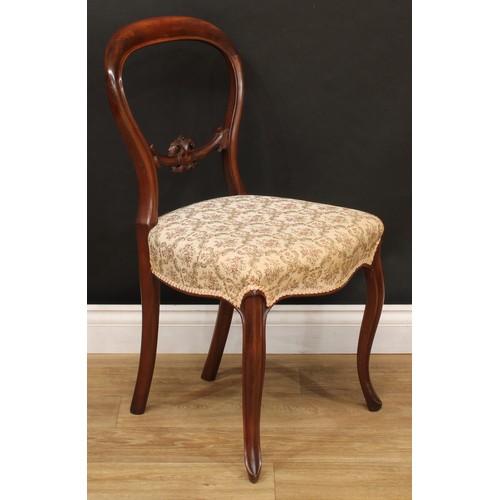 522 - A Victorian spoon back open armchair, 95cm high, 67cm wide, the seat 48cm wide and 47cm deep; a set ... 