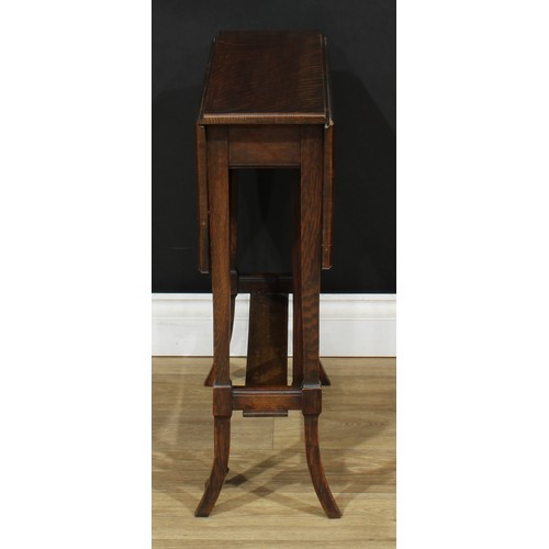 523 - An early 20th century oak Sutherland table, 67cm high, 61cm wide, c.1910