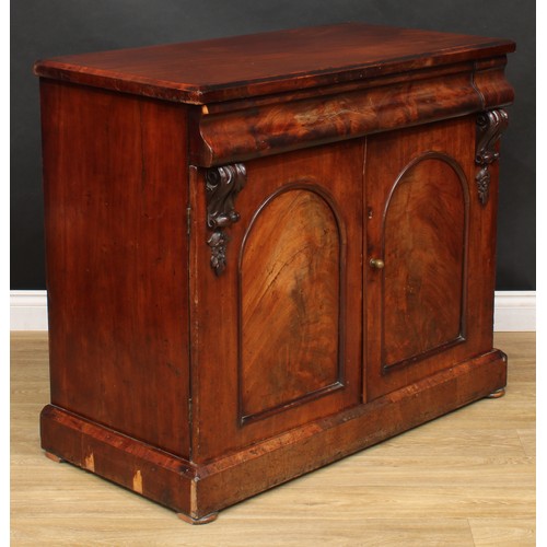 528 - A Victorian mahogany side cabinet or low chiffonier, rectangular top above a long concave moulded fr... 