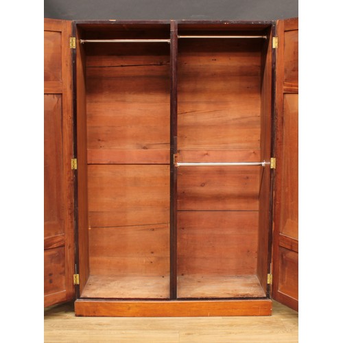 530 - A mahogany wardrobe, flame-veneered panel doors, 184cm high, 125cm wide, 48.5cm deep