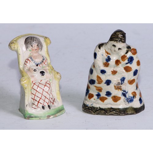 379 - A Prattware  figure, modelled as a lady wrapped in a shawl, sponged in tones of blue and brown, 7.5c... 