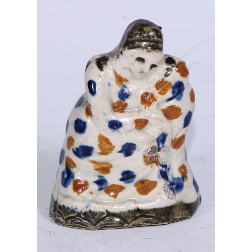379 - A Prattware  figure, modelled as a lady wrapped in a shawl, sponged in tones of blue and brown, 7.5c... 