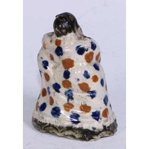 379 - A Prattware  figure, modelled as a lady wrapped in a shawl, sponged in tones of blue and brown, 7.5c... 