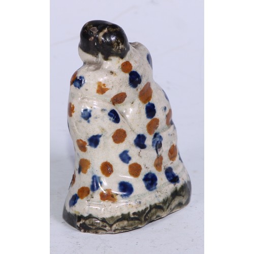 379 - A Prattware  figure, modelled as a lady wrapped in a shawl, sponged in tones of blue and brown, 7.5c... 