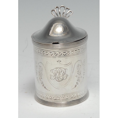 69 - A George III Neoclassical silver oval mustard, engraved with swags of bell husks flanking a monogram... 