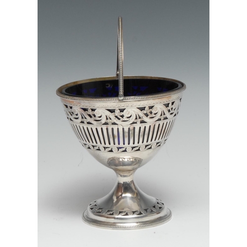 68 - A George III Irish silver pedestal urnular sugar basket, pierced and bright-cut engraved, beaded bor... 