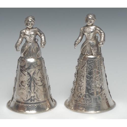 128 - A pair of 19th century Dutch silver marriage cups, cast in the Renaissance manner as figures in long... 