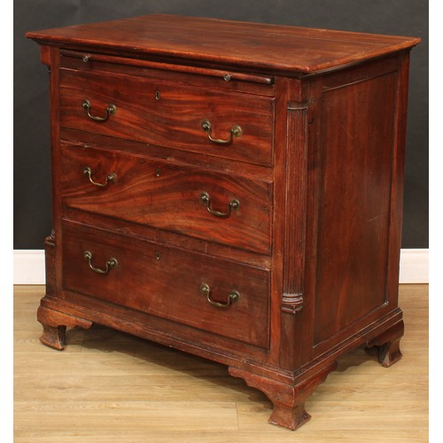 1803 - A George III mahogany bachelor's chest, oversailing rectangular top a slide and three long drawers, ... 