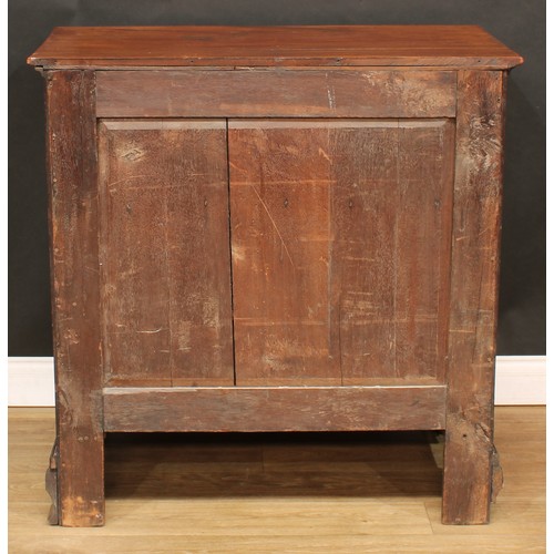 1803 - A George III mahogany bachelor's chest, oversailing rectangular top a slide and three long drawers, ... 