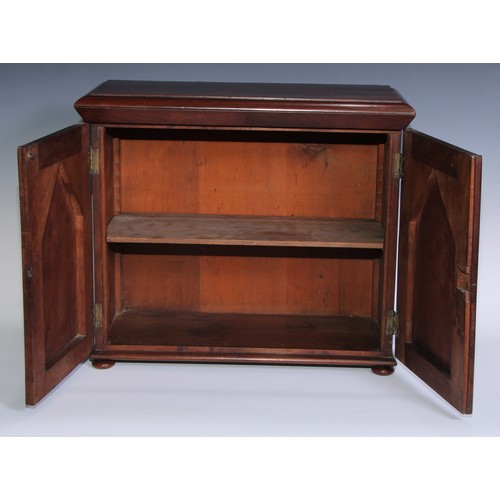 1804 - A William IV mahogany table cabinet, moulded rectangular top above a pair of rectangular doors with ... 