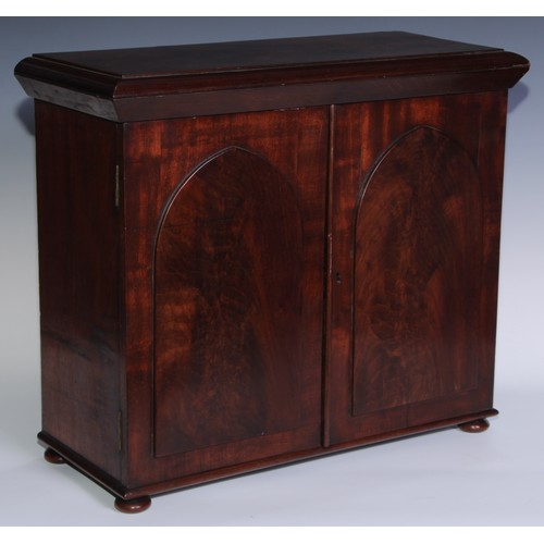 1804 - A William IV mahogany table cabinet, moulded rectangular top above a pair of rectangular doors with ... 