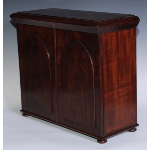 1804 - A William IV mahogany table cabinet, moulded rectangular top above a pair of rectangular doors with ... 