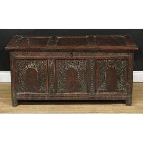 1809 - A 17th/early 18th century oak three panel blanket chest, 56cm high, 118cm wide, 53.5cm deep, c.1700