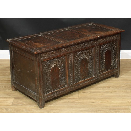 1809 - A 17th/early 18th century oak three panel blanket chest, 56cm high, 118cm wide, 53.5cm deep, c.1700