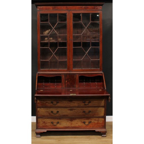 1811 - A George III mahogany bureau bookcase, moulded cornice above a pair of doors enclosing a shelf, fall... 